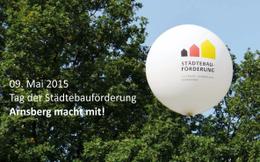 Bild zeigt Luftballon mit dem Logo der Städtebauförderung (vergrößerte Bildansicht wird geöffnet)